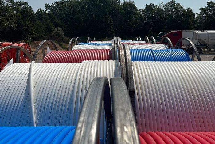 HDPE conduit pipe are stacked on top of each other.